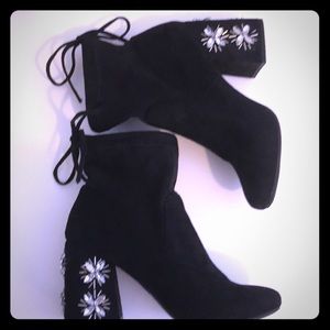 Black heeled booties with rhinestone detailing